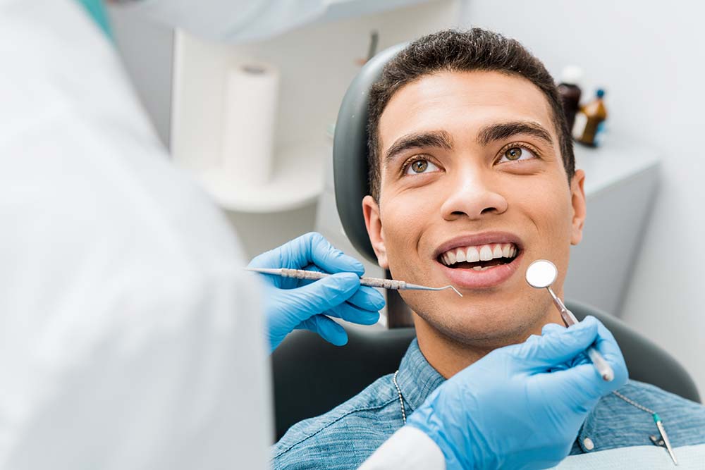 Belle Smile | Extractions, Implant Supported Overdentures and Orthodontics